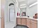 Bright bathroom with a shower and vanity featuring soft lighting and neutral tones at 329 Lakebridge Xing, Canton, GA 30114