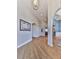 Bright foyer featuring hardwood floors, recessed lighting, arched doorways, and detailed trim work at 329 Lakebridge Xing, Canton, GA 30114