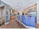 Stylish kitchen showcases hardwood floors, breakfast bar, stainless steel appliances and custom cabinetry at 329 Lakebridge Xing, Canton, GA 30114