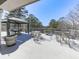 Spacious patio area with outdoor seating, a gazebo, and views of the surrounding trees at 329 Lakebridge Xing, Canton, GA 30114