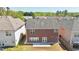 A view of the backyard with a small patio and grass at 5819 Rue Chase Way, Tucker, GA 30084