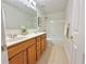 Bathroom with double sink vanity and shower over tub combination at 5819 Rue Chase Way, Tucker, GA 30084