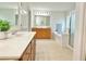 Double sink vanity with a white countertop in a spacious bathroom at 5819 Rue Chase Way, Tucker, GA 30084