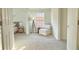 Cozy bedroom sitting area with lots of natural light at 5819 Rue Chase Way, Tucker, GA 30084