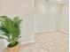Neutral bedroom with neutral carpet and a decorative plant at 5819 Rue Chase Way, Tucker, GA 30084