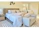 Beautiful bedroom with a decorative rug and cozy seating area at 5819 Rue Chase Way, Tucker, GA 30084