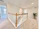 Hallway with carpet flooring that leads to various rooms at 5819 Rue Chase Way, Tucker, GA 30084