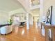 Spacious living area with hardwood floors, neutral decor, and dining space at 5819 Rue Chase Way, Tucker, GA 30084