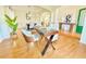 Office area featuring hardwood floors, ample natural light, and open-concept layout at 5819 Rue Chase Way, Tucker, GA 30084