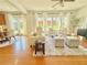Inviting living room with natural light, hardwood floors, and neutral decor at 5819 Rue Chase Way, Tucker, GA 30084