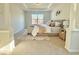 Main bedroom boasting tray ceilings, neutral colors, and ample natural light at 5819 Rue Chase Way, Tucker, GA 30084