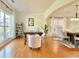 Office area featuring hardwood floors, ample natural light, and neutral decor at 5819 Rue Chase Way, Tucker, GA 30084