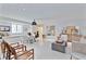 Bright and airy living room featuring white walls, modern furnishings, and a cozy window seat at 90 Polo Ne Dr, Atlanta, GA 30309