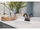 Bathroom featuring a white countertop, a modern faucet, and decorative elements at 146 Silver Leaf Trce, Douglasville, GA 30134