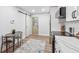 Kitchen area with modern stainless steel appliances and an exterior door at 1849 S Columbia Place, Decatur, GA 30032