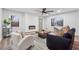 Inviting living room with modern fireplace, comfortable seating, and natural light showcasing the open floor plan at 1849 S Columbia Place, Decatur, GA 30032