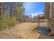 Expansive backyard featuring a deck with stairs leading down from the house at 4283 Brighton Nw Way, Kennesaw, GA 30144