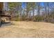 Expansive backyard featuring a deck with stairs leading down from the house at 4283 Brighton Nw Way, Kennesaw, GA 30144