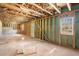 Unfinished basement with exposed framework, concrete floor, and natural light at 4283 Brighton Nw Way, Kennesaw, GA 30144