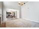 Spacious living room with open layout, high ceiling, and eat in kitchen view at 4283 Brighton Nw Way, Kennesaw, GA 30144