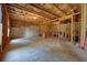 Spacious unfinished basement with exposed beams and concrete flooring, awaiting your personal design at 66 Snowdon Way, Villa Rica, GA 30180