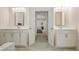 Elegant bathroom with double vanities and view to bedroom at 66 Snowdon Way, Villa Rica, GA 30180