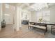 Elegant dining area with coffered ceilings, modern chandelier, and stylish hardwood floors at 66 Snowdon Way, Villa Rica, GA 30180