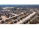 An aerial view of a beautiful neighborhood with well-maintained homes and mature trees at 2401 Day Break Way, Dacula, GA 30019