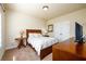 Cozy bedroom featuring neutral walls, plush carpet, and a decorative bedspread at 2401 Day Break Way, Dacula, GA 30019