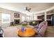 Bright living room with fireplace open to the kitchen area at 2401 Day Break Way, Dacula, GA 30019