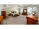 Spacious main bedroom suite with sitting area, trey ceiling, and lots of space at 2401 Day Break Way, Dacula, GA 30019