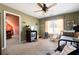 Comfortable bedroom with a ceiling fan and window that offers natural light at 5034 Kingsbridge Pass, Powder Springs, GA 30127