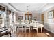 Bright and airy dining room with hardwood floors, chandelier, and picturesque views at 5034 Kingsbridge Pass, Powder Springs, GA 30127