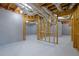 Spacious unfinished basement featuring exposed framing, ideal for customization and expansion at 5690 Rutland Trce, Lithonia, GA 30058