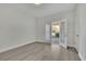 Bright bedroom with new floors and french doors leading to an outdoor space at 5690 Rutland Trce, Lithonia, GA 30058