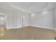 Spacious bedroom with modern ceiling fan and hardwood floors, offering a bright and airy atmosphere at 5690 Rutland Trce, Lithonia, GA 30058