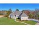 Charming home with manicured lawn, elegant walkway, and a mix of modern and traditional design elements at 5690 Rutland Trce, Lithonia, GA 30058