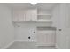 Convenient laundry room with cabinets and countertop space for folding at 5690 Rutland Trce, Lithonia, GA 30058