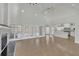 Bright, open-concept living area with fireplace and a modern kitchen, perfect for entertaining at 5690 Rutland Trce, Lithonia, GA 30058