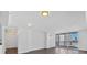 Spacious living room with hardwood floors and balcony access with city views at 620 Peachtree Ne St # 1613, Atlanta, GA 30308