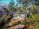 Backyard with an expansive deck and lush landscaping, perfect for outdoor enjoyment at 629 Hansell Se St, Atlanta, GA 30312