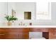 Bathroom with vanity, sink, drawers, and a large mirror at 629 Hansell Se St, Atlanta, GA 30312