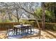 Deck with table, chairs and an area rug at 629 Hansell Se St, Atlanta, GA 30312