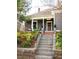 Inviting home exterior featuring brick stairs and an attractive porch at 629 Hansell Se St, Atlanta, GA 30312