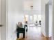 Hallway featuring hardwood floors and an inviting seating area at 629 Hansell Se St, Atlanta, GA 30312