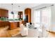 Open kitchen with an island, modern appliances, and a dining table with seating at 629 Hansell Se St, Atlanta, GA 30312