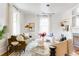 Bright living room with hardwood floors, fireplace, modern light fixture and stylish decor at 629 Hansell Se St, Atlanta, GA 30312