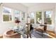 Bright and airy home office featuring a glass-top desk and lots of natural light at 629 Hansell Se St, Atlanta, GA 30312