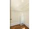 Empty walk-in closet with wooden floors and wire shelving providing a blank canvas for personalized storage solutions at 629 Hansell Se St, Atlanta, GA 30312