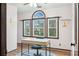 Bedroom featuring three windows, a desk and a chair at 703 Somerset Dr, Lawrenceville, GA 30046